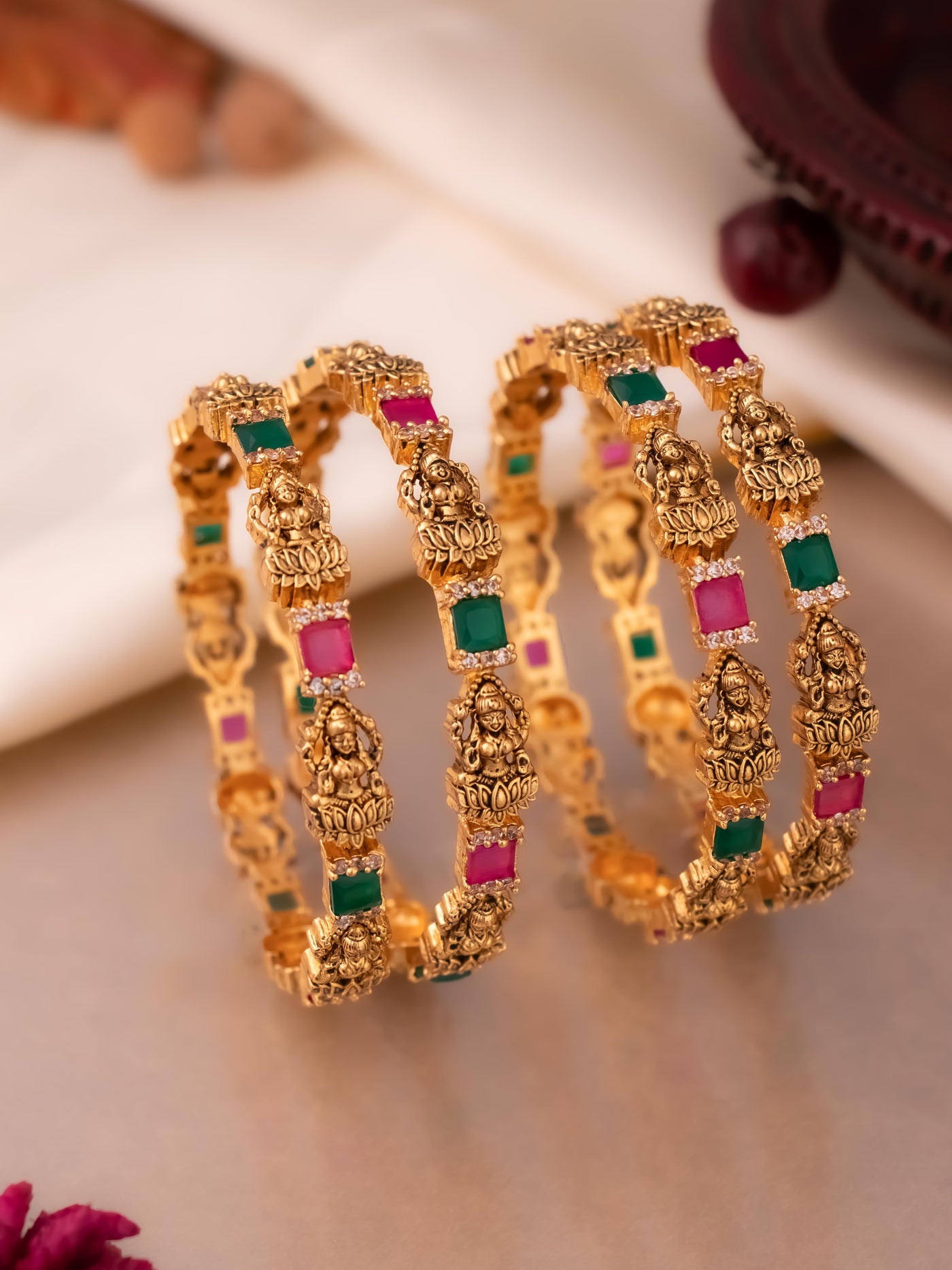 Four set traditional south Indian Laxmi bangles in ruby-green colour
