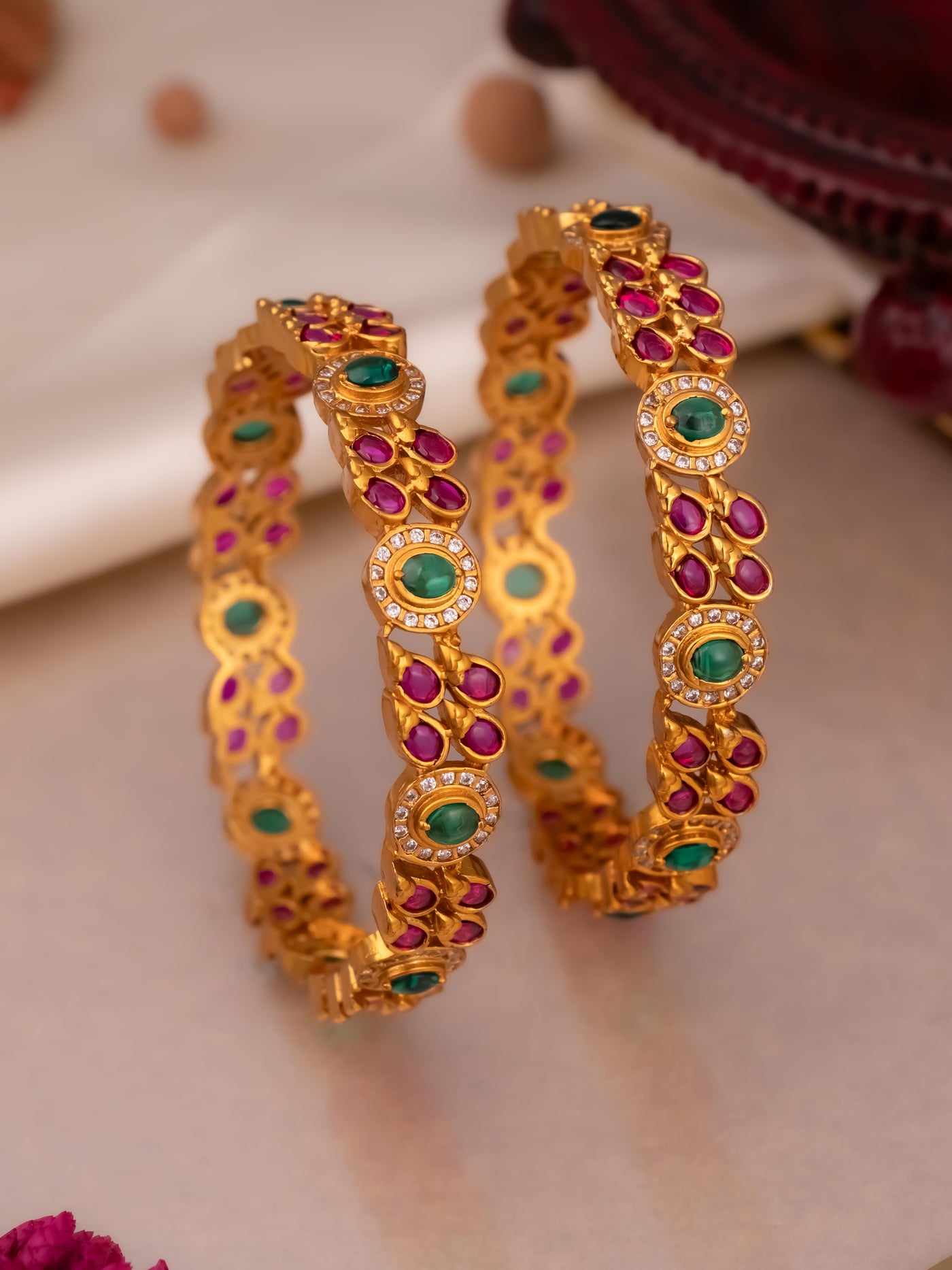 Elegant kemp bangles are now avaialble in ruby and green hues perfect for traditional attire.
